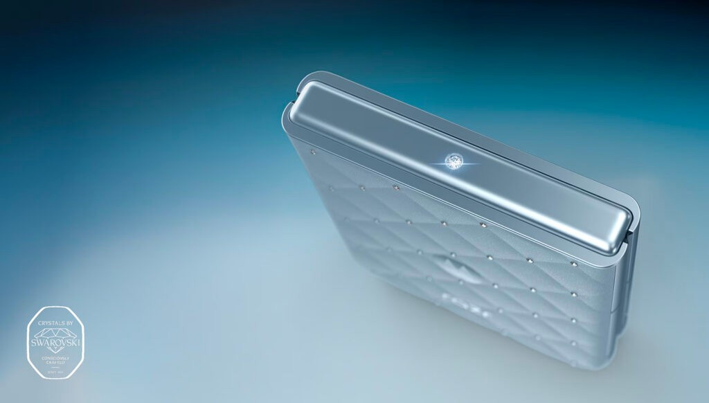 Bản lề cũng chứa một viên pha lê lớn, được cắt chính xác với 26 mặt cắt, cạnh phải có các phím âm lượng lấy cảm hứng từ pha lê.