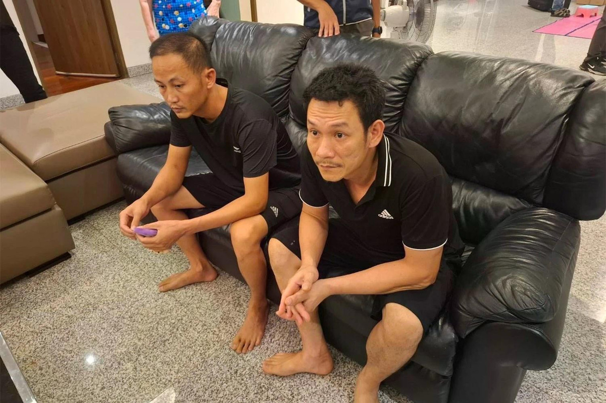 Hai vệ sĩ của Ngo Thi Theu bị bắt. Ảnh: Bangkok Post.