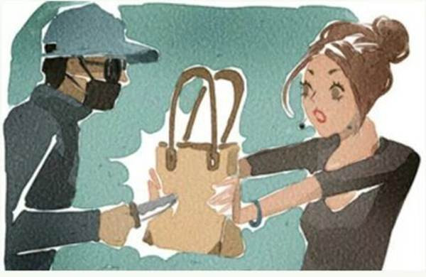 Nếu kẻ cướp có vũ khí dùng dao đâm bạn, hãy nhanh tay đưa túi xách ra đỡ lấy.