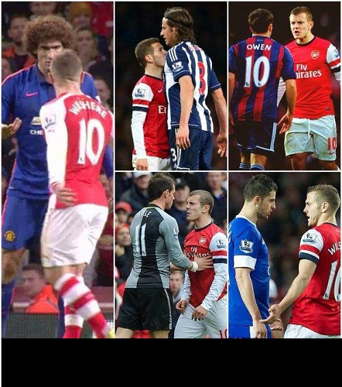 Jack Wilshere (áo đỏ) bé người nhưng rất hay có những hành động khiêu khích các cầu thủ to cao. Mới đây trong trận đấu với MU của Arsenal, chính cầu thủ nhỏ con này đã "cà khịa" với cầu thủ cao lớn Fellaini.