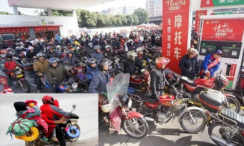 Hàng triệu xe máy tại Trung Quốc "đội rét" về quê ăn Tết