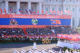 Kỷ niệm trọng thể 50 năm Quốc khánh nước Cộng hòa Dân chủ Nhân dân Lào