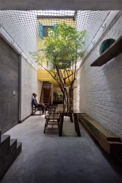 Căn nhà bên ngoài lụp xụp, rộng chỉ 3m nhưng bên trong lại có thiết kế đặc biệt - Hình 10 Can nha ben ngoai lup xup, rong chi 3m nhung ben trong lai co thiet ke dac biet-Hinh-10