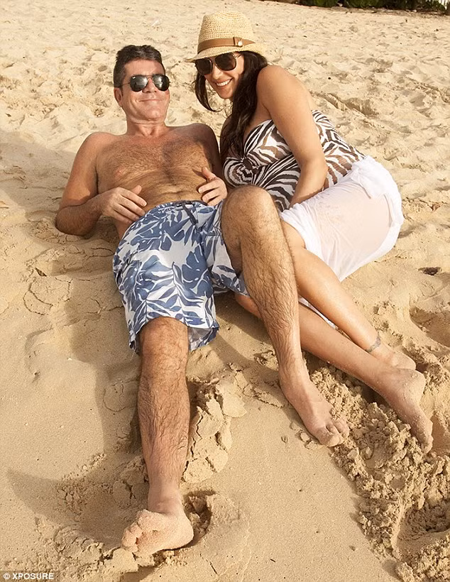 Giám khảo cuộc thi The X Factor Simon Cowell đang có một kỳ nghỉ thư giãn tuyệt vời với cô bạn gái người Mỹ Lauren Silverman tại khu nghỉ dưỡng Barbados.