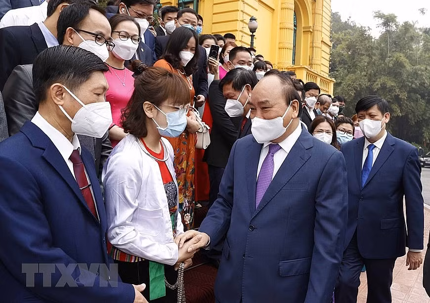 Chủ tịch nước Nguyễn Xuân Phúc gặp mặt thân mật Đoàn đại biểu cán bộ y tế tiêu biểu nhân kỷ niệm 67 năm Ngày Thầy thuốc Việt Nam.