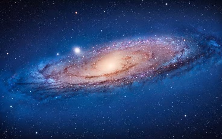  2. Kích cỡ khác biệt của các thiên hà. Dải Ngân Hà (Milky Way) chứa khoảng 100 – 400 tỷ ngôi sao, có quy mô rất nhỏ so với IC 1101, thiên hà lớn nhất từng quan sát được. IC 1101 có đường kính lên tới 6 triệu năm ánh sáng và chứa khoảng 100 nghìn tỷ ngôi sao. Ảnh: Pinterest.