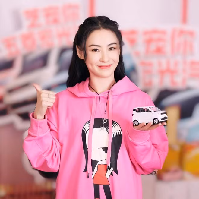 Nhan sac tuoi 41 cua Truong Ba Chi, tu tin co dan ong tot theo duoi-Hinh-2