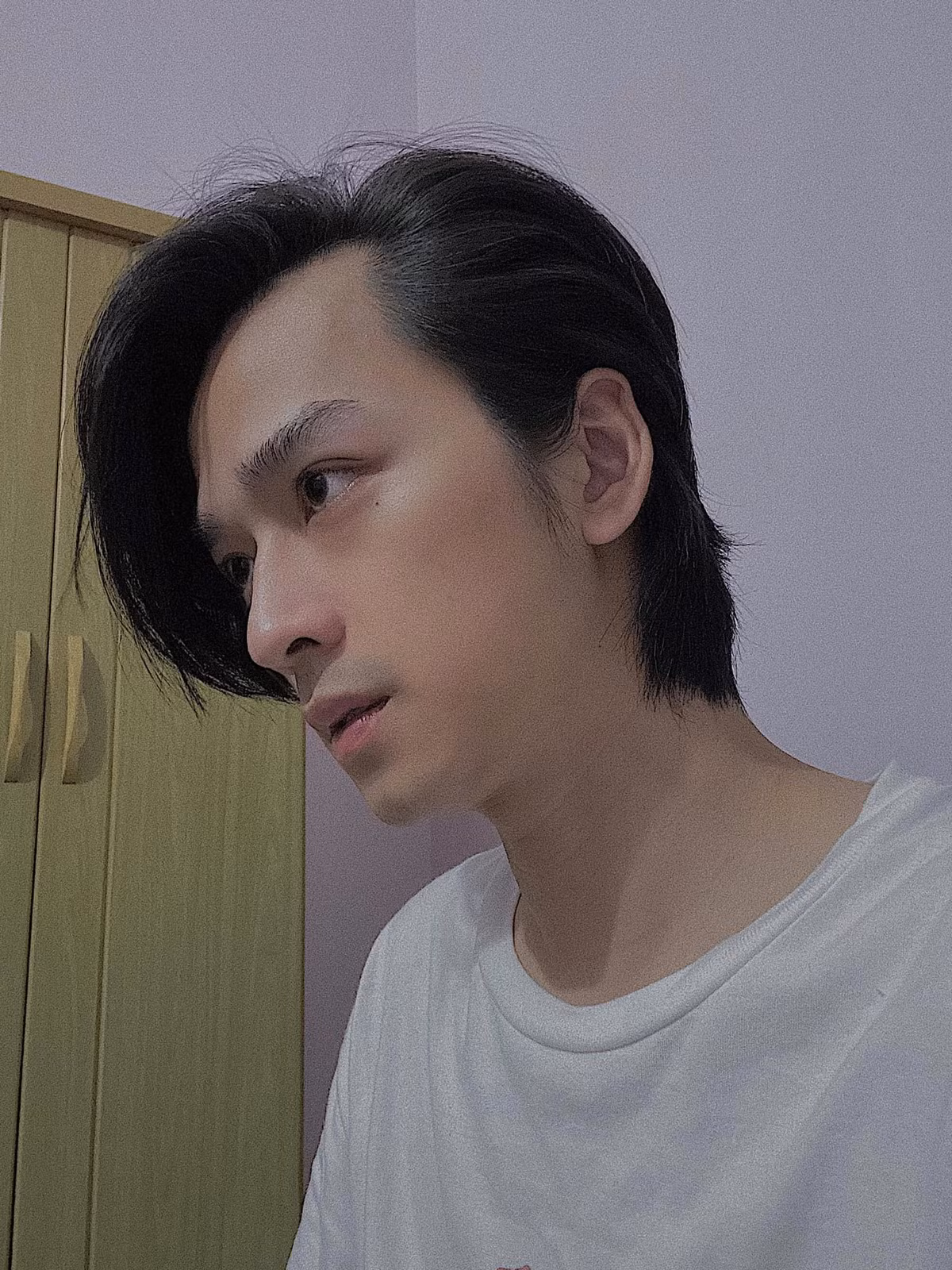 Trần Nghĩa than tóc quá dài.