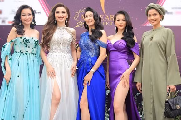 Nam Em can nguoi diu tren tham do hop bao Miss Earth Vietnam