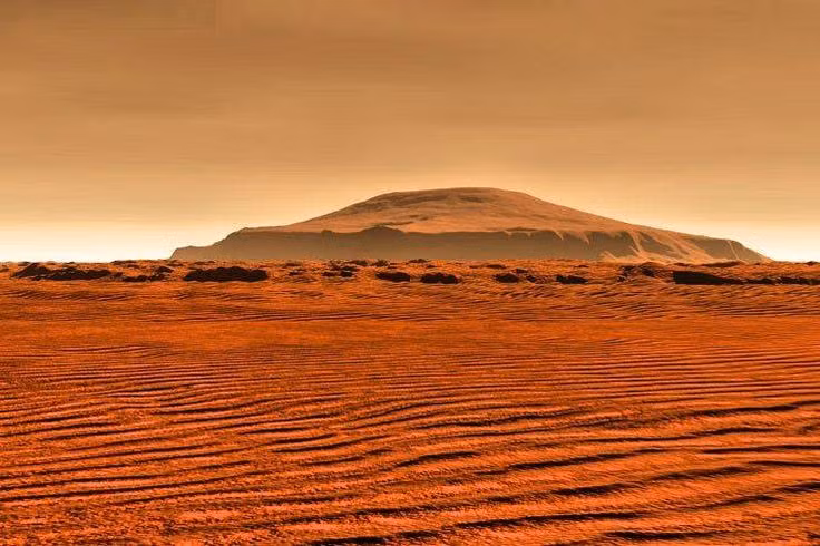  Độ dốc thoải: Các sườn của Olympus Mons có độ dốc thấp, giúp dung nham dễ dàng lan rộng mà không bị đông cứng nhanh. Ảnh: Pinterest.