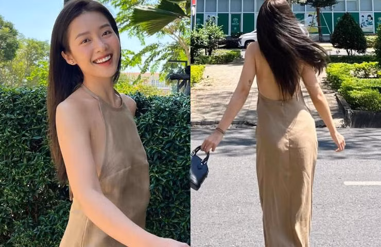 Mùa xuân năm nay, xu hướng cổ yếm lấy cảm hứng đồ truyền thống được nhiều mỹ nhân ưa chuộng để tôn hình thể. Ảnh: nữ diễn viên Khả Ngân dạo đường phố Sài Gòn với váy yếm.