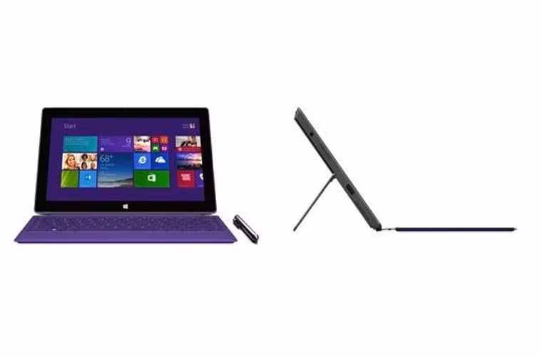 Microsoft Surface Pro 2. Xét về tính di động, Surface Pro 2 có thiết kế máy hơi lớn và nặng nề. Nhưng nếu bạn đang tìm kiếm một chiếc máy tính bảng mạnh mẽ dành cho doanh nhân, đây lại là một trong những sự lựa chọn tốt nhất. Microsoft đã cải thiện thêm nhiều tính năng trên Surface Pro 2 so với phiên bản cũ với bản update hệ điều hành Window 8.1, chip xử lý Intel mạnh mẽ, thời lượng pin lâu hơn và đặc biệt, chân đứng phía sau có thêm một nấc dựng mới, cho phép máy mở ở 2 góc độ là 75 độ và 55 độ.
