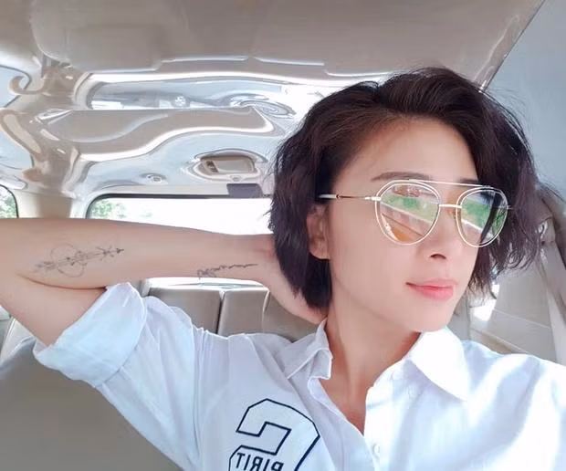 Ngo Thanh Van hiem hoi khoe hinh xam ca doi, lien quan Huy Tran?-Hinh-9