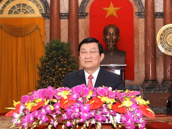 Chủ tịch nước Trương Tấn Sang chúc Tết tới đồng bào, đồng chí, các lực lượng vũ trang trong cả nước và kiều bào ở nước ngoài. (Ảnh: Nguyễn Khang/TTXVN)