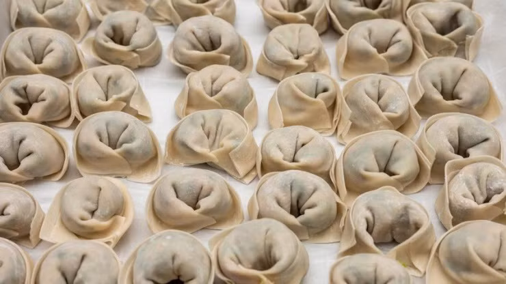 Trung Quốc điều tra nhà hàng tổ chức cho khách thi ăn bánh bao Trung Quoc dieu tra nha hang to chuc cho khach thi an banh bao
