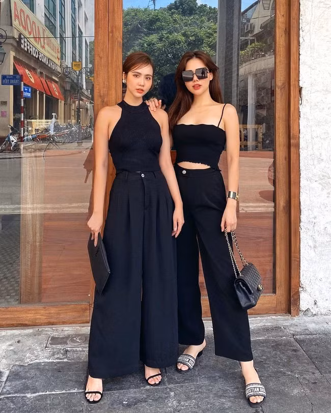 Huyền Lizzie rất biết cách tạo điểm nhấn cho những set đồ all-black. Bí kíp của cô chỉ đơn giản là đeo khuyên tai vàng, tô son môi tông màu đất cực "tây".