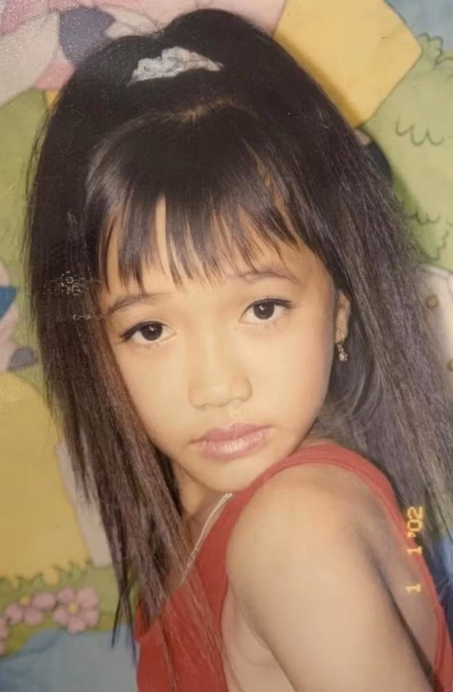 Dieu Nhi 'khui' anh nam 2000: Toc dap xu, moi hong canh sen