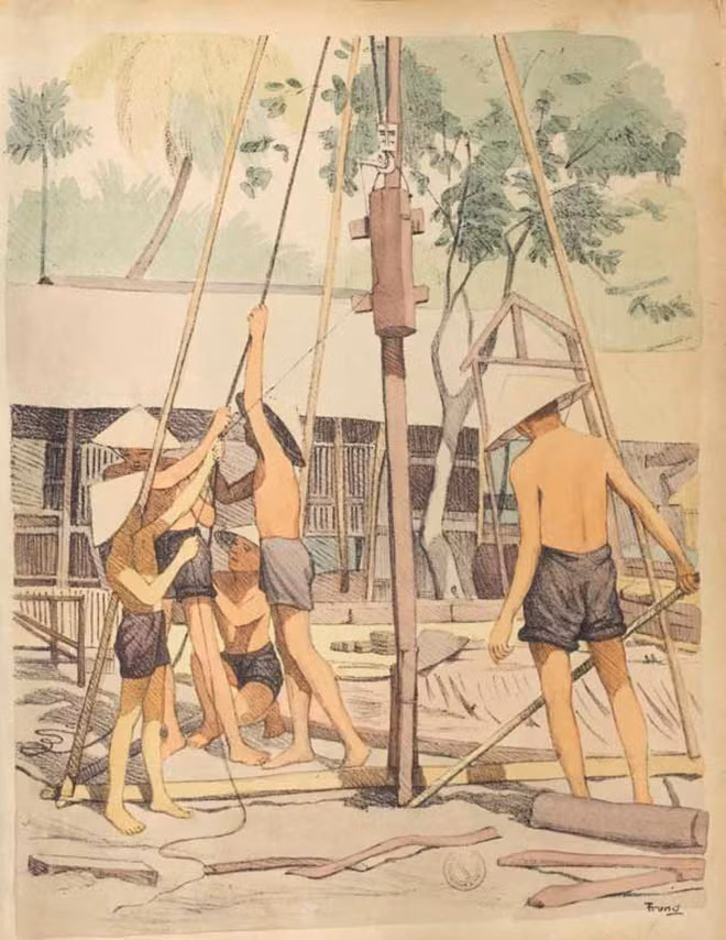 br/> Những người thợ đang nhồi cọc xây nhà.