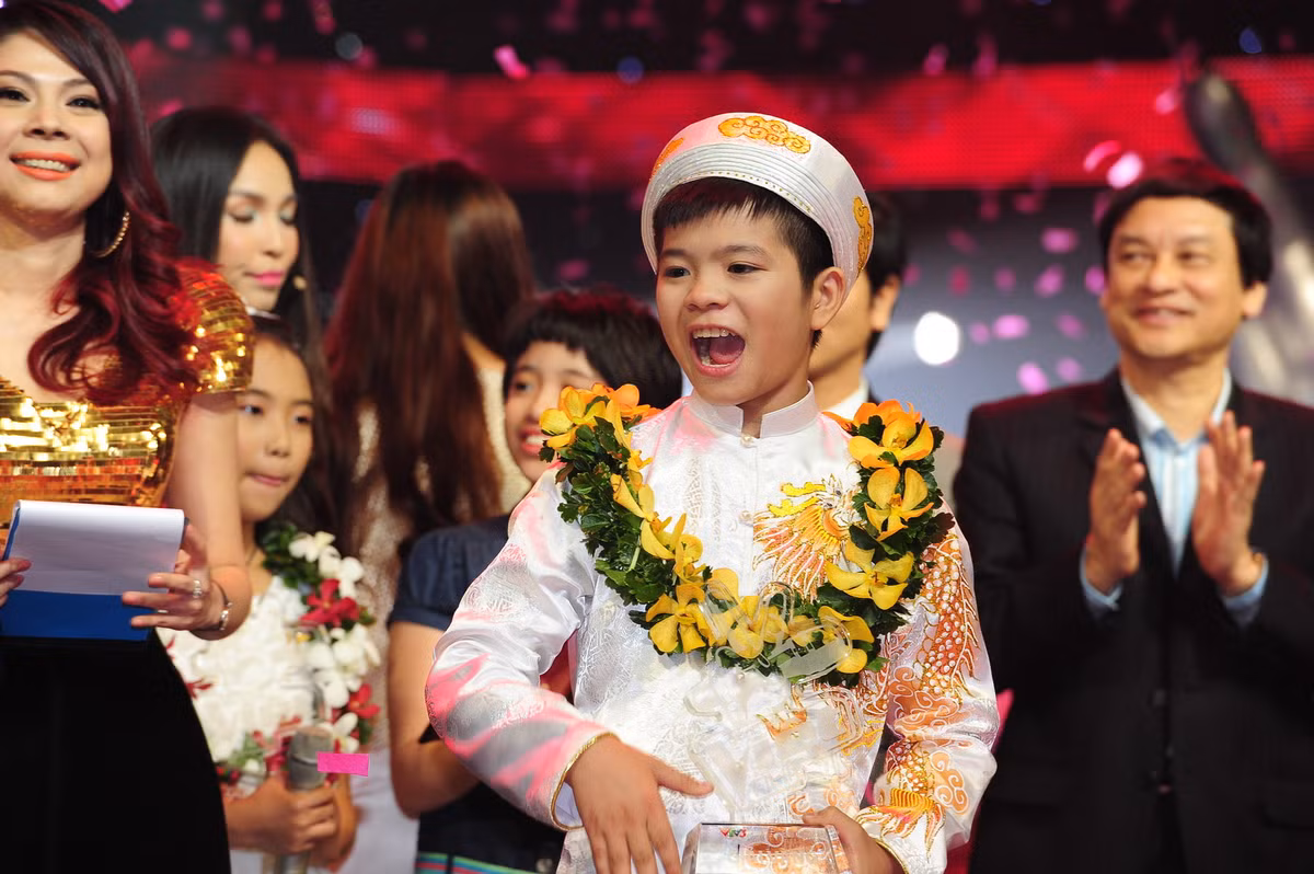 Quang Anh cười rạng rỡ khi biết mình chiến thắng. (Ảnh: Lý Võ Phú Hưng)