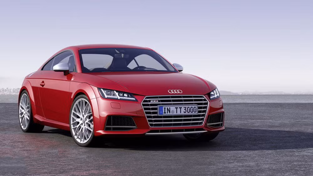 Audi TT 2015. Đây là mẫu xe thể thao nhỏ gọn mang phong cách thiết kế tinh tế, bắt mắt cùng những công nghệ hiện đại nhất của Audi. Với 2+2 chỗ ngồi, nội thất của Audi TT 2015 có thiết kế đậm chất thể thao, sang trọng. Mẫu Coupe này được trang bị hàng loạt hệ thống thông tin giải trí và hỗ trợ tiên tiến của Audi nhằm mang lại sự thoải mái nhất cho hành khách.
