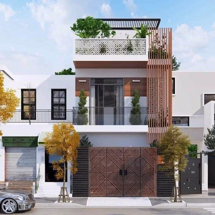 Điểm nhấn của căn biệt thự này chính là hệ thống cây xanh trải đều từ tầng 1 đến sân thượng. Hai bên cổng là hai cây lớn. Sân thượng được sử dụng làm một khu vườn nhỏ để gia chủ thỏa mãn đam mê.