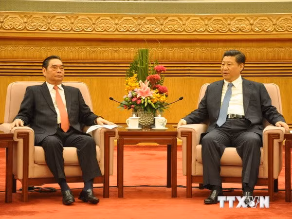 Thường trực Ban Bí thư Lê Hồng Anh hội kiến với Tổng Bí thư, Chủ tịch nước Trung Quốc Tập Cận Bình. (Ảnh: Hải Yến/TTXVN).