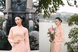 Hoa khôi bóng chuyền Nguyệt Anh diện áo dài rất xinh đẹp chào đón năm mới 