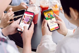 Lì xì online, ví điện tử lên ngôi: Tết không tiền mặt của người trẻ