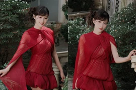 Kiều Trinh Xíu khoe sắc rực rỡ trong váy đỏ, gương mặt trẻ trung gây chú ý