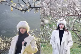 Đỗ Yên Đan chụp ảnh trong vườn hoa mận, nổi bật giữa mùa xuân Tây Bắc