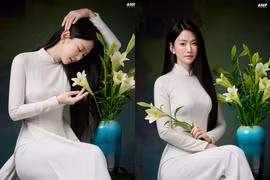 Lê Bống diện áo dài trắng tái hiện bức tranh “Thiếu nữ bên hoa huệ”