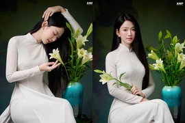 Lê Bống diện áo dài trắng tái hiện bức tranh “Thiếu nữ bên hoa huệ”