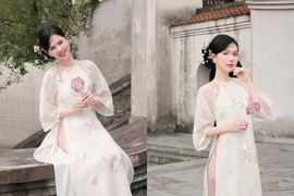 ‘Nữ hoàng nội y’ Ngọc Trinh xinh đẹp, trong veo trong tà áo dài