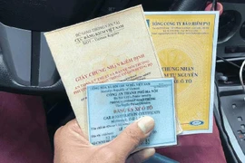 Chủ xe từ tháng 3 có thể được cấp chứng nhận kiểm định bản điện tử thay cho bản giấy. Ảnh: T.H.