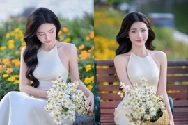 Hoa khôi Thanh lịch Hà Nội 2025 khoe dáng dịu dàng bên cúc họa mi