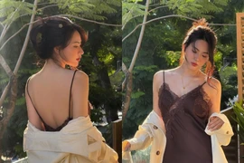 Nguyễn Minh Trang khoe trọn lưng trần gợi cảm, đẹp mong manh dưới nắng