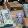 Tiền nhàn rỗi đổ vào ngân hàng, tiền gửi dân cư tăng kỷ lục