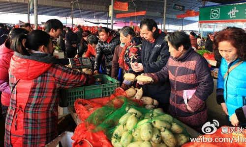 Khung cảnh chợ Tết ở Trung Quốc qua ảnh