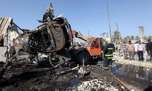 Hiện trường vụ đánh bom khiến 60 người chết ở Iraq