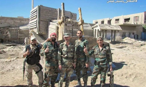 Ảnh quân đội Syria đánh trả phiến quân ở quận Al-Qaboun 