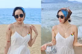Phương Linh khoe thềm ngực gợi cảm trên bãi biển Nha Trang