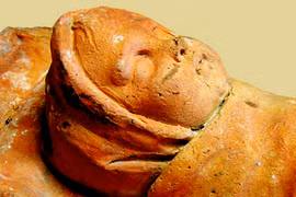 Ngôi mộ trẻ em 8.000 năm tuổi tiết lộ bí mật rùng mình 