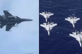 J-15 mang tên lửa hành trình YJ-15 (bên trái) và các tiêm kích J-15 hoạt động từ tàu sân bay Liêu Ninh và Sơn Đông