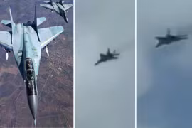 MiG-29 (bên trái) và MiG-29 bay trên bầu trời Tehran vào ngày 28 tháng 2.