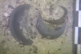 Bình kỳ lạ dưới hồ thiêng Maya ẩn chứa điều gì bí mật?