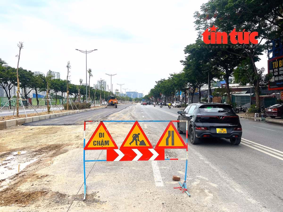 Sau 3 tháng rào chắn để thi công, nhà thầu đang khẩn trương hoàn trả mặt đường và các hạng mục kỹ thuật trên đường Võ Chí Công.