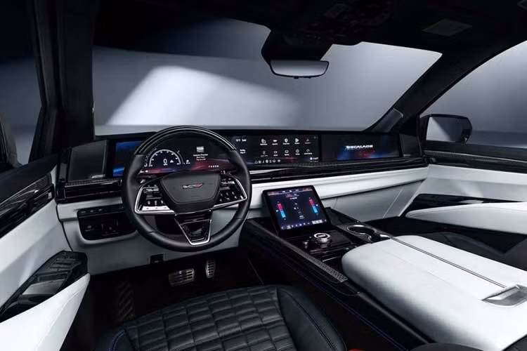 Bên trong không gian cabin của Escalade-V phiên bản giới hạn nổi bật với tông màu xám Sheer Gray kết hợp đen làm chủ đạo. Sắc xanh Santorini Blue - màu sắc đại diện trên logo V-Series kết nối các dòng xe thương mại với xe đua V-Series.R.