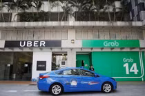 Singapore điều tra thỏa thuận chấn động giữa Uber và Grab
