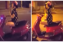 Hãi hùng thiếu nữ vừa khoanh chân niệm phật vừa lái xe