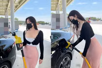 Đứng đổ xăng, gái xinh khoe ngực khủng "ngộp thở"